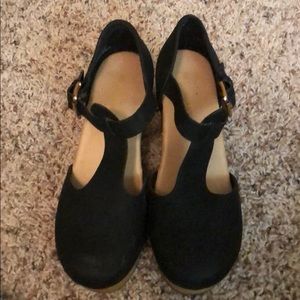 Black t-strap clogs